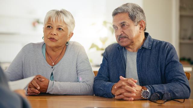 older couple speaking to financial advisor