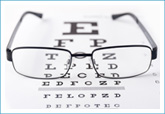 eyeglasses on eye chart